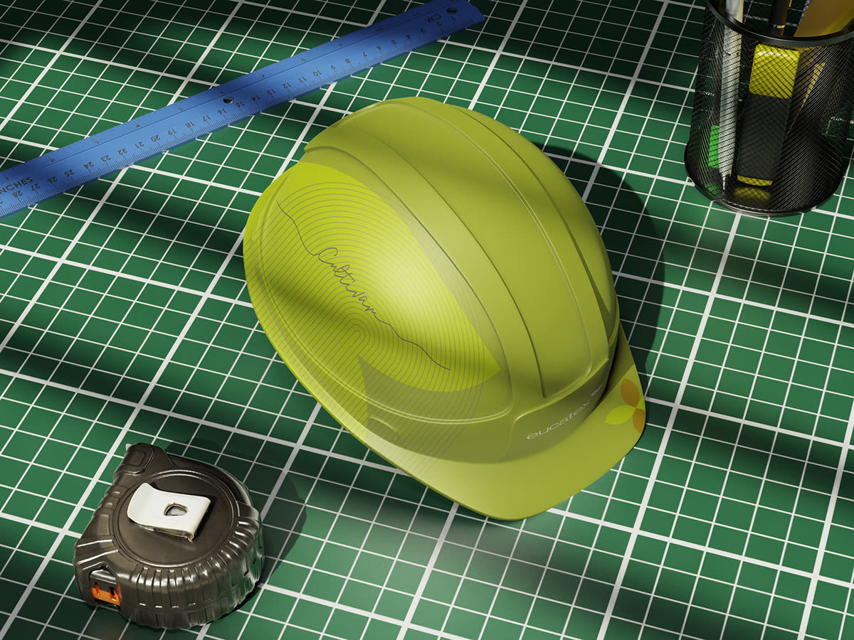 Capacete de obra verde-limão com a assinatura Cultivar gravada, sobre base de corte verde ao lado de régua e trena.